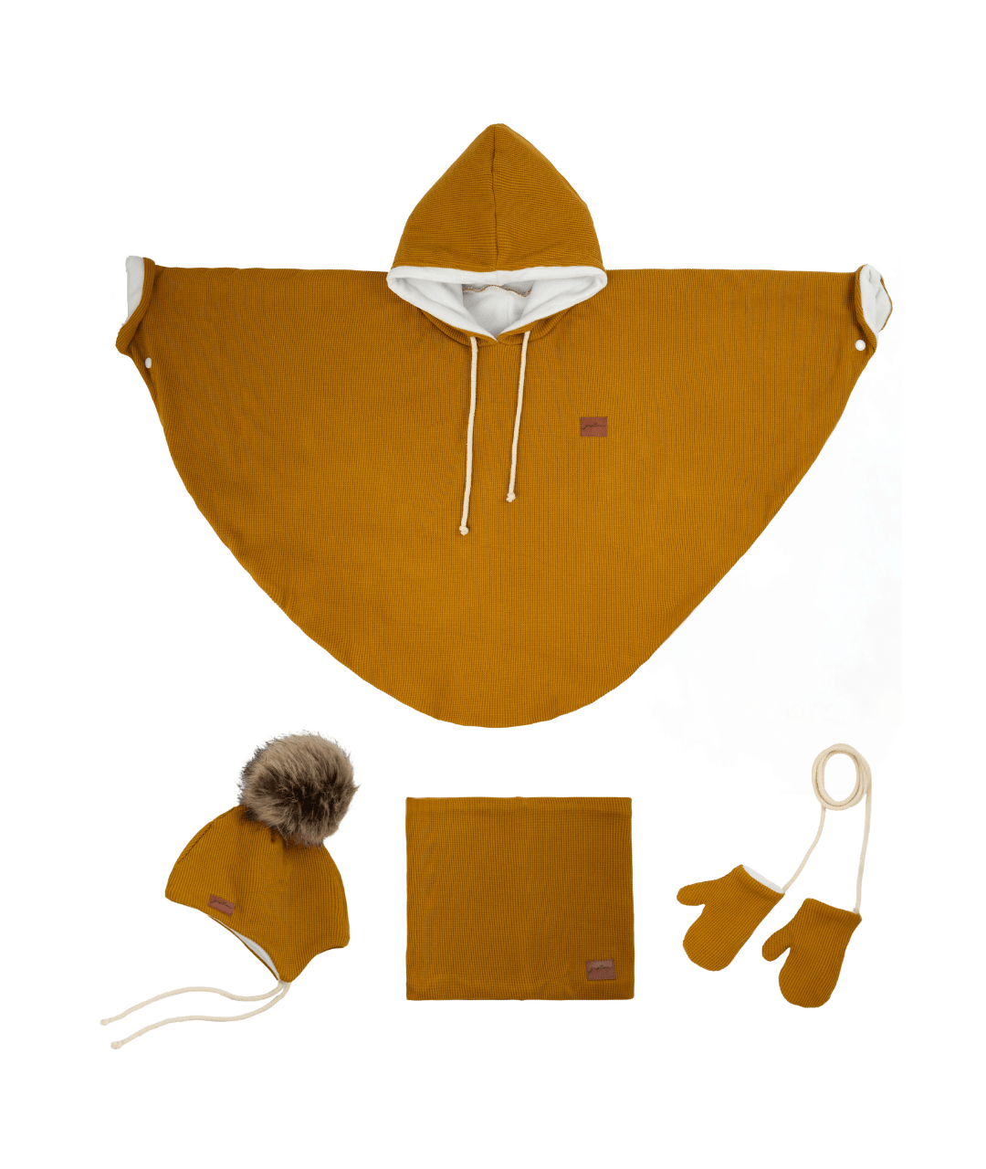 Poncho and accessories with pompom