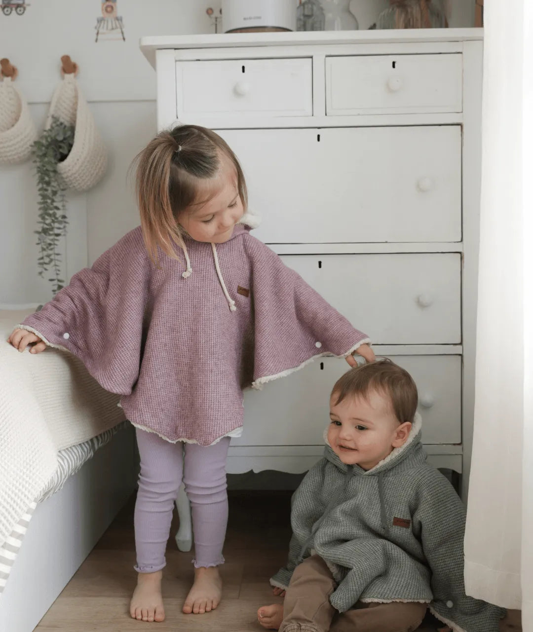 Evolving knitted poncho