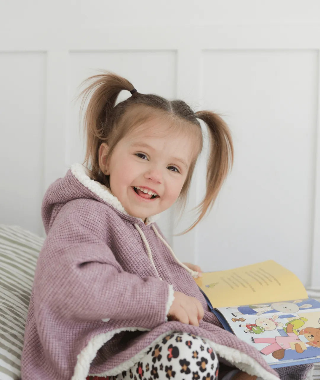 Evolving knitted poncho