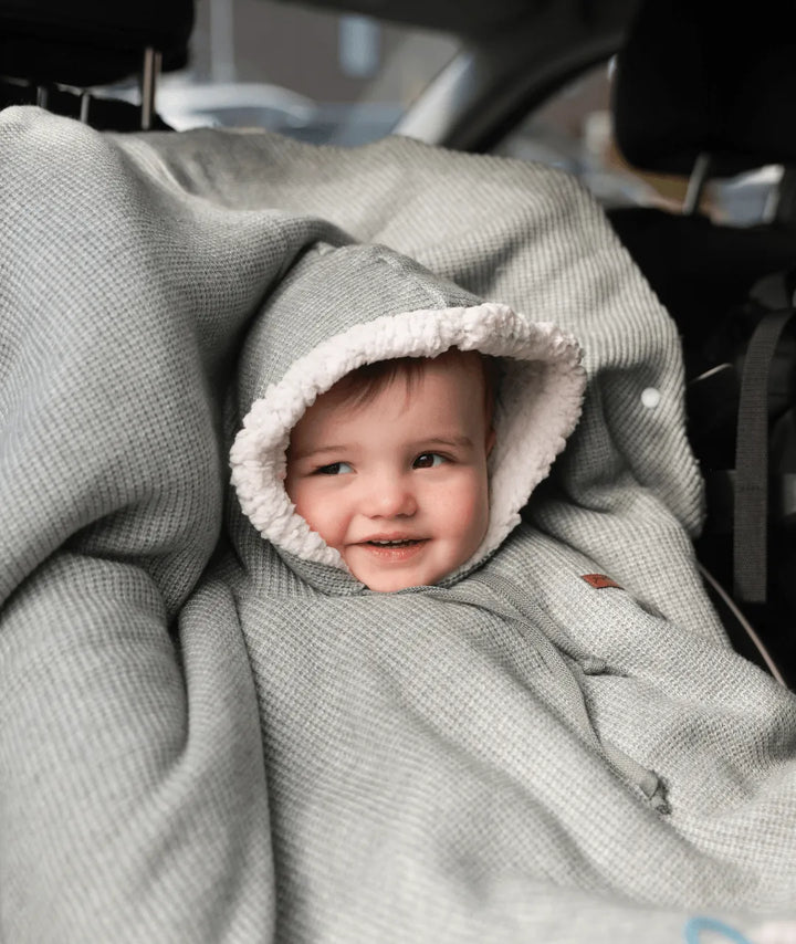 Evolving knitted poncho