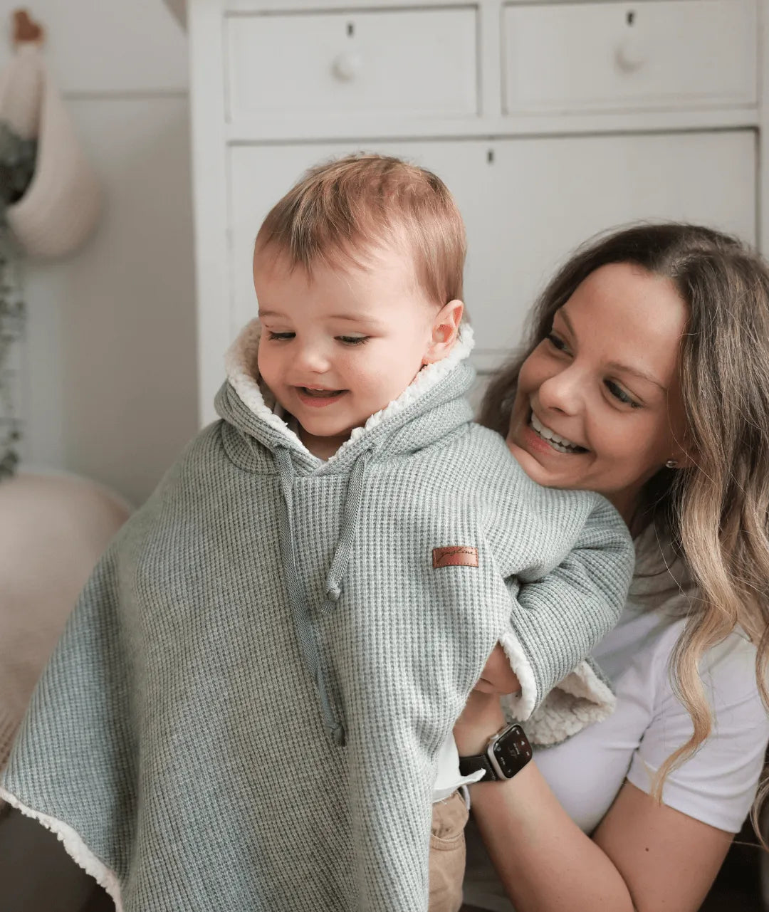 Evolving knitted poncho